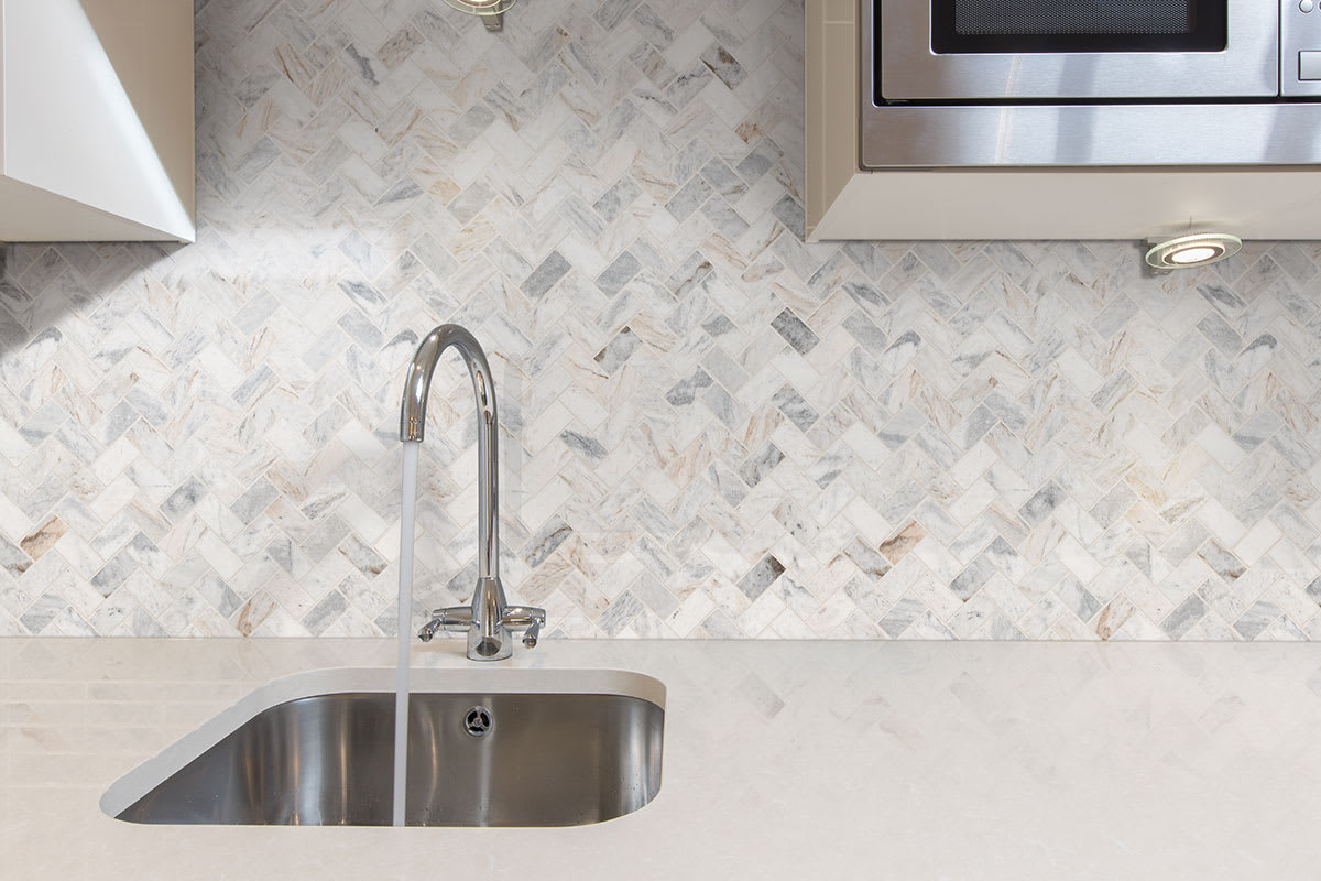 Capri Blue Herringbone Honed
