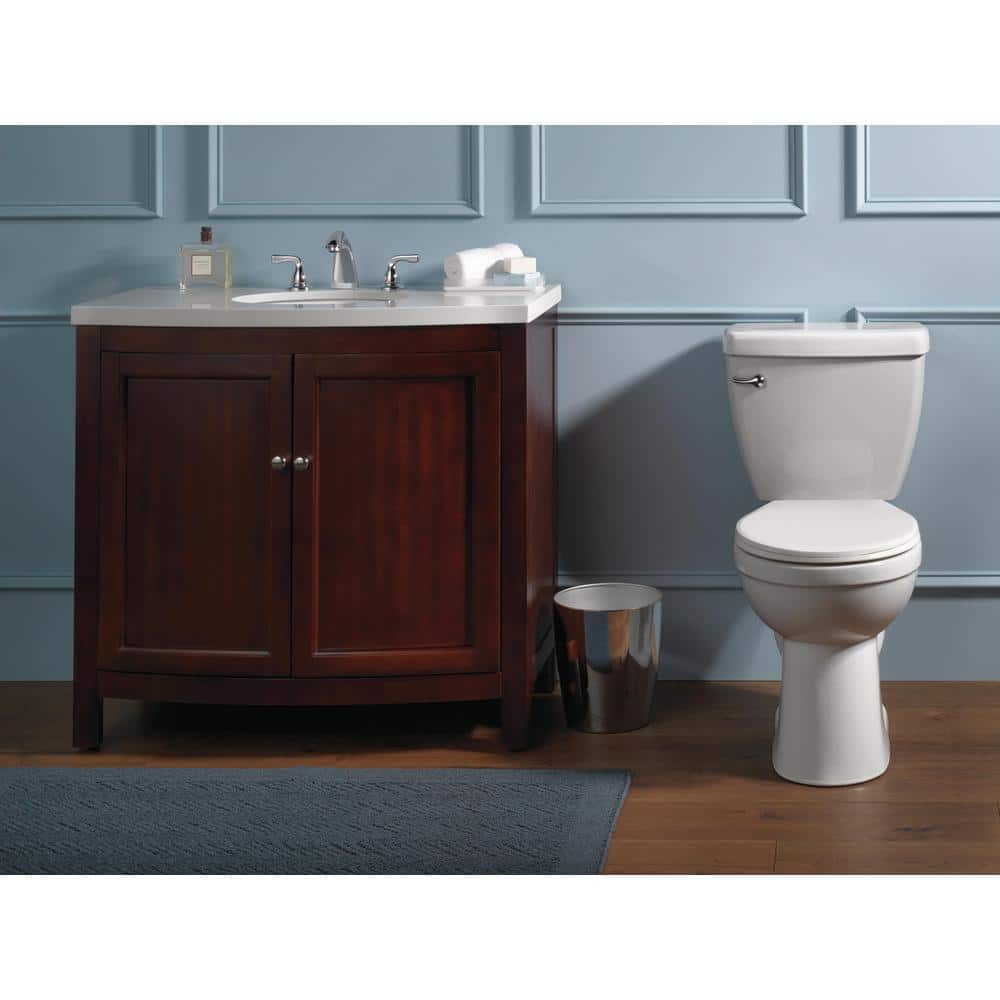 Foundations 2-Piece 1.28 GPF Single Flush Round Toilet in White