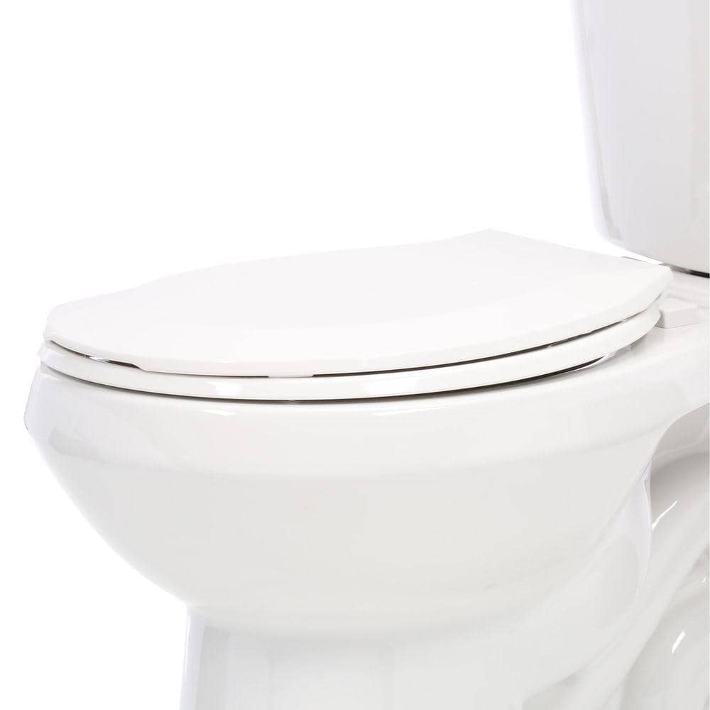 Glacier Bay 2-piece 1.1 GPF/1.6 GPF Dual Flush Round Toilet in White