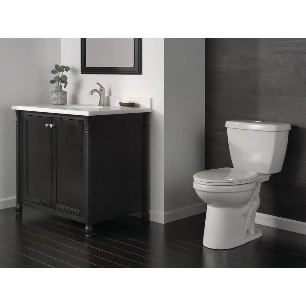 Foundations 2-Piece 1.1 GPF/1.6 GPF Dual Flush Elongated Toilet in White