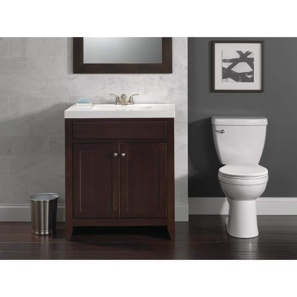 Foundations 2-Piece 1.28 GPF Single Flush Elongated Toilet in White