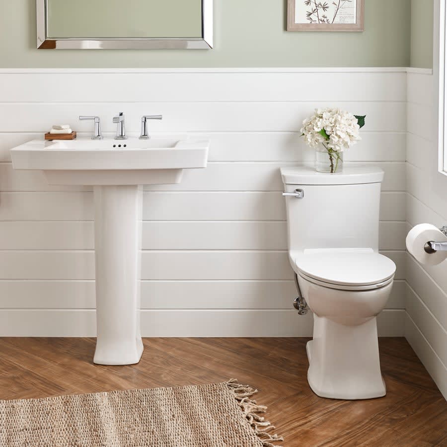 Townsend 1.28 GPF One-Piece Elongated Comfort Height Toilet with Left Hand Tank Lever and Seat Included